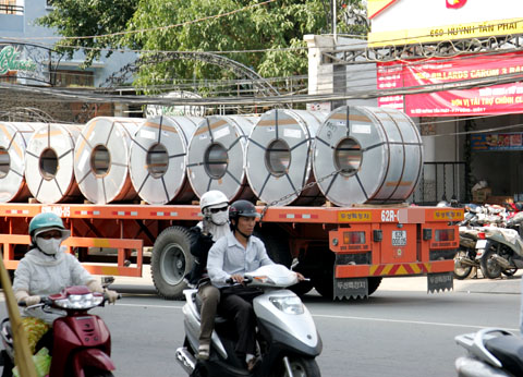 Perils from trucks on the street in Vietnam