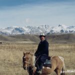 Kyrgyz man on a horse - Naryn, Kyrgyzstan